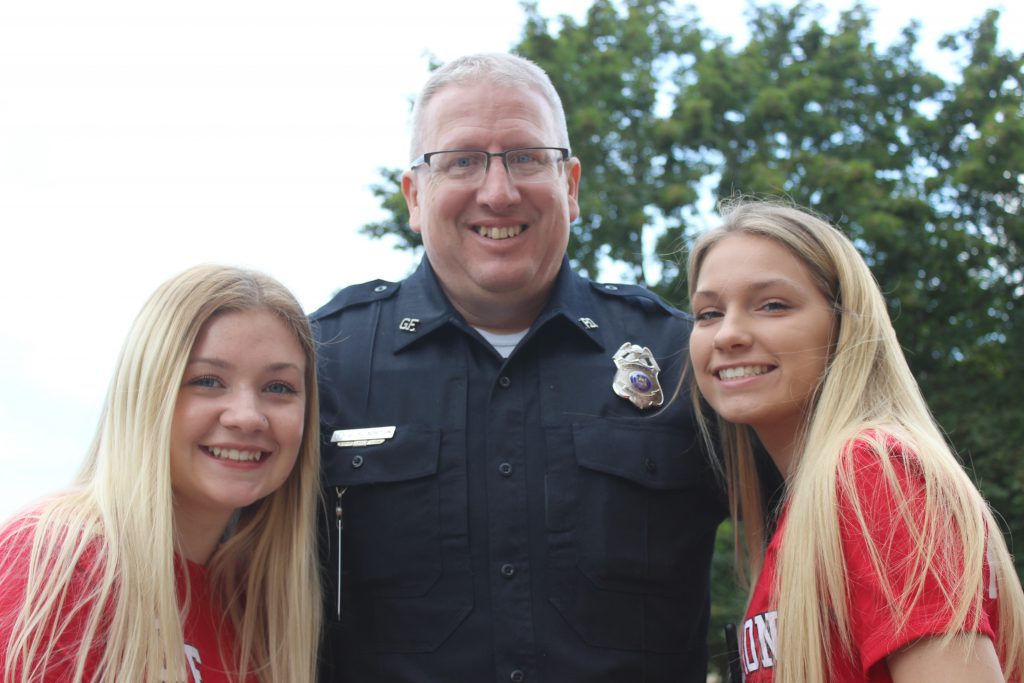 Officer Norton with students on opening day