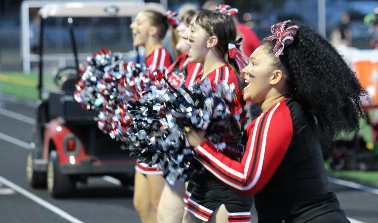 GFHS cheerleaders on the sidelines of the first home football game of the year