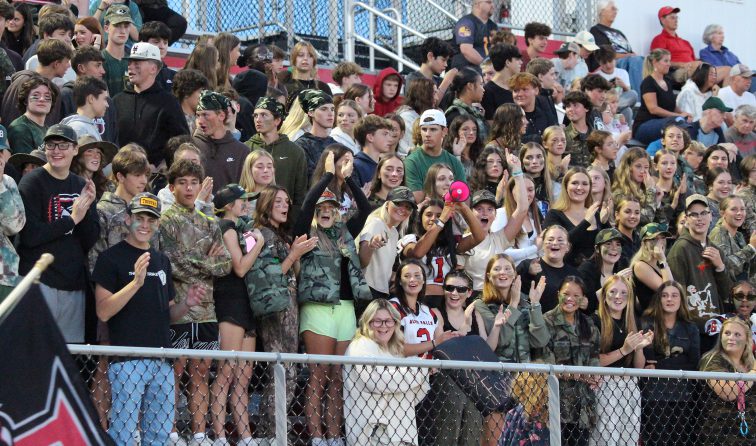 The student section cheers at the first home football game of the season