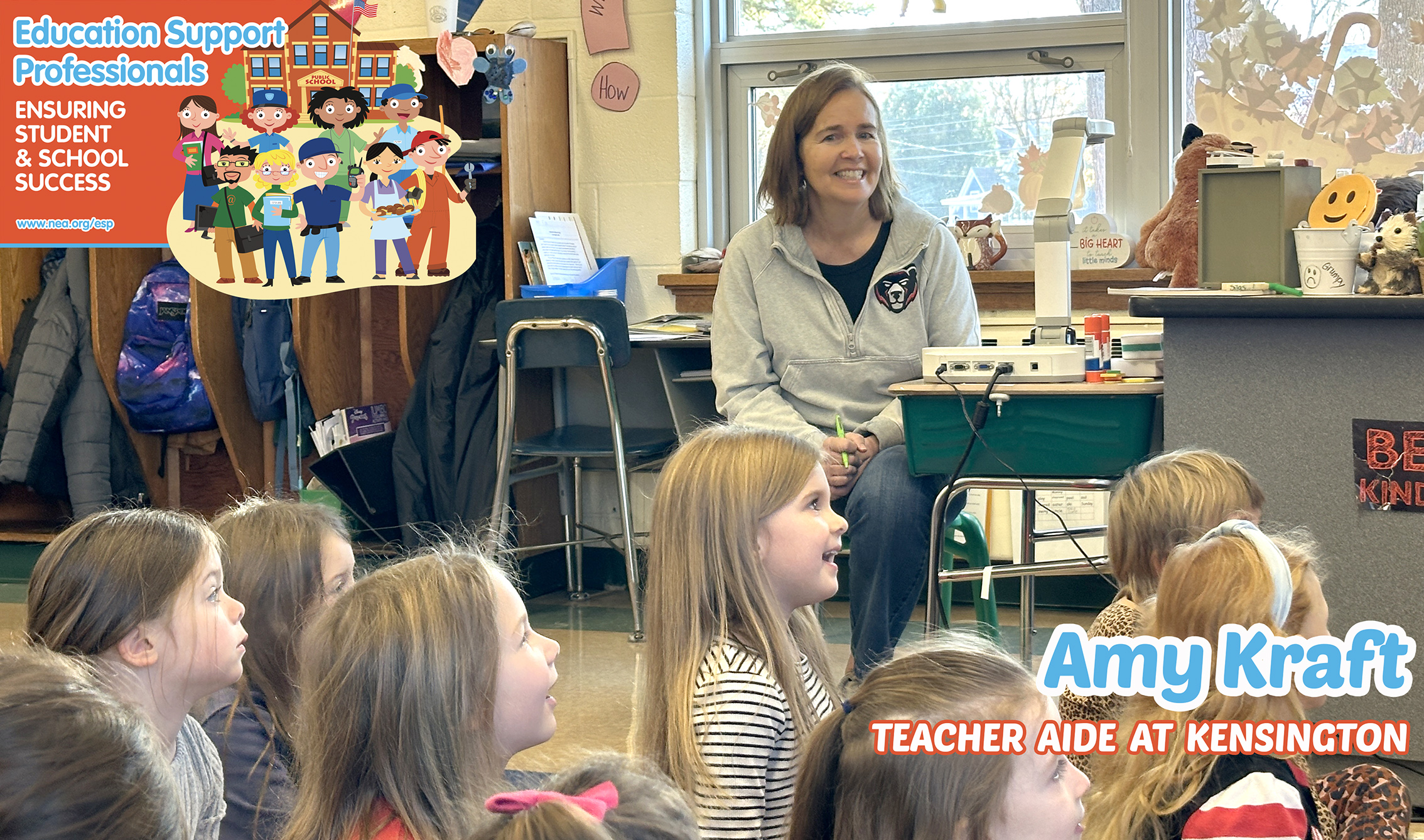 Mrs. Kraft smiling with students as they brainstorm words with the letter A